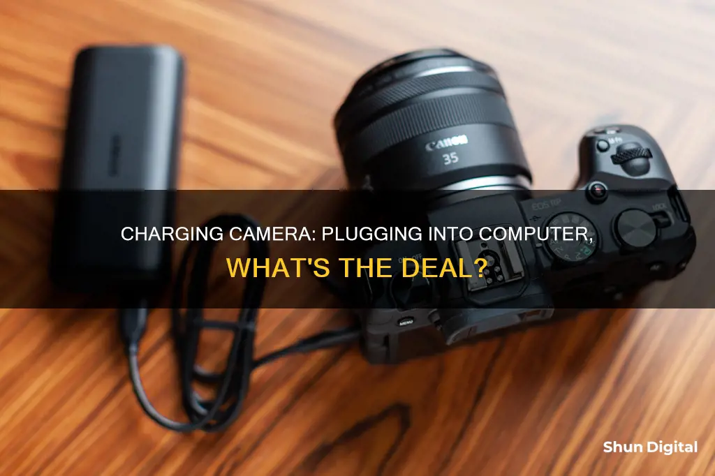 am I charging camera when pluging it in to computer