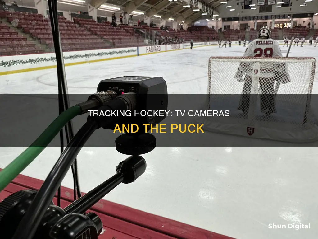 how do tv cameras track hockey pucks