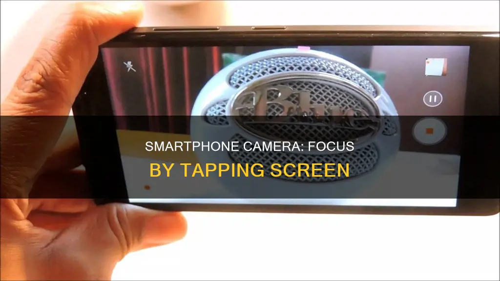 how does a smartphone camera focus by tapping on screen