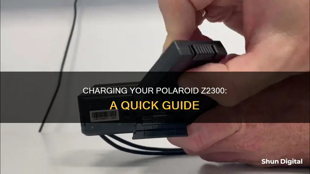 how to charge a polaroid z2300 camera