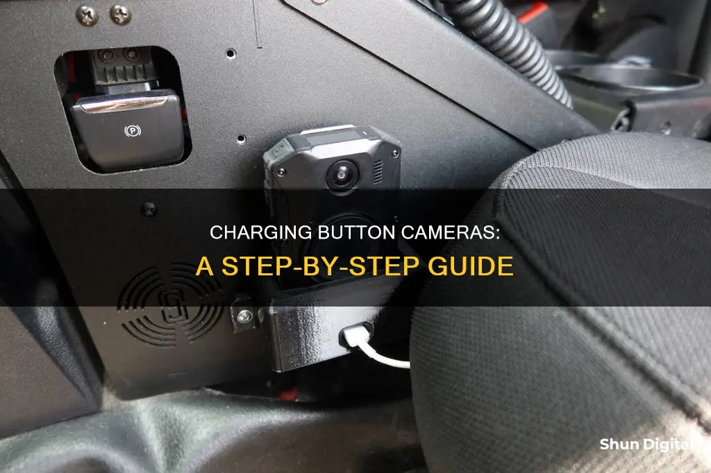 how to charge button camera