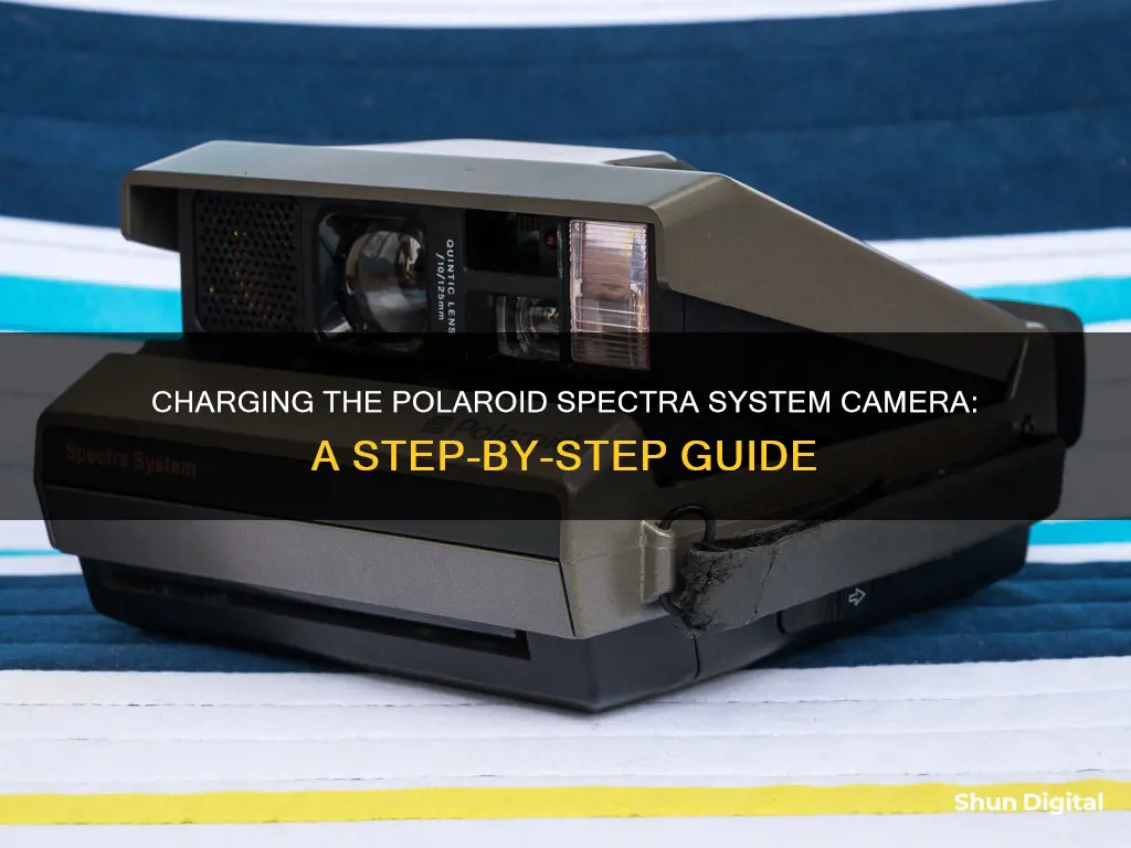 how to charge polaroid spectra system camera