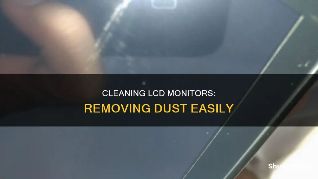 how to et dust that sits in behind lcd monitor