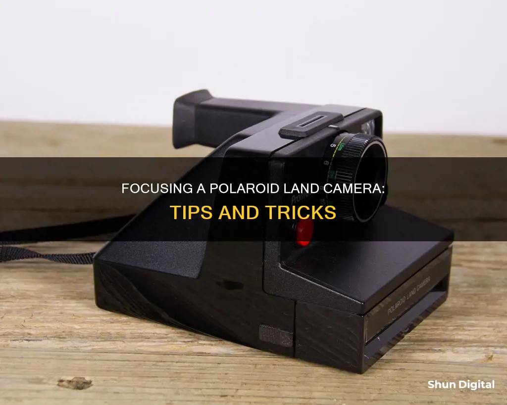 how to focus a polaroid land camera