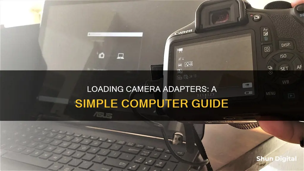 how to load a camera adapter into my computer