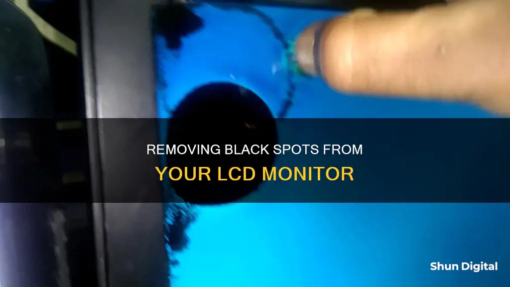 how to remove black spot on lcd monitor