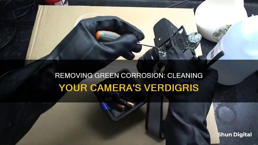 how to remove green corrosion from camera