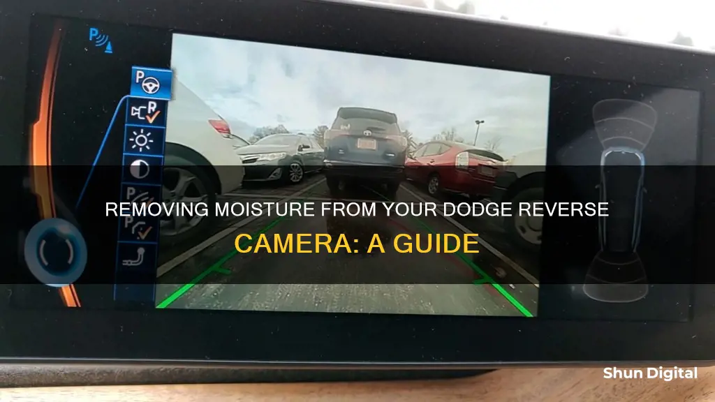 how to remove moisture from a dodgfe reverse camera