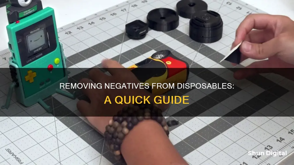 how to remove negatives from a disposible camera