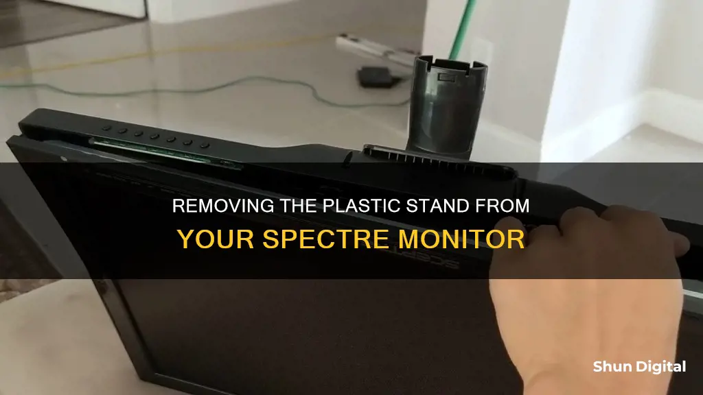 how to remove plastic stand for monitor spectre