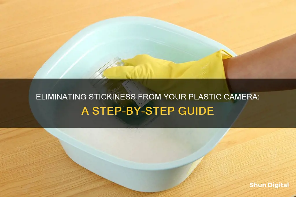 how to remove stickiness from plastic camera