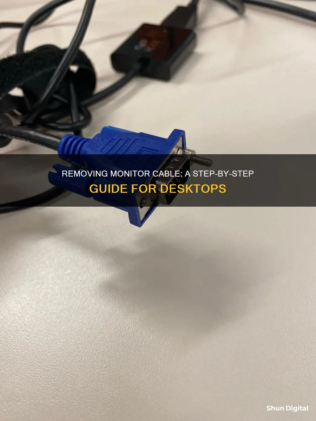 how to remove the monitor cable on a desktop