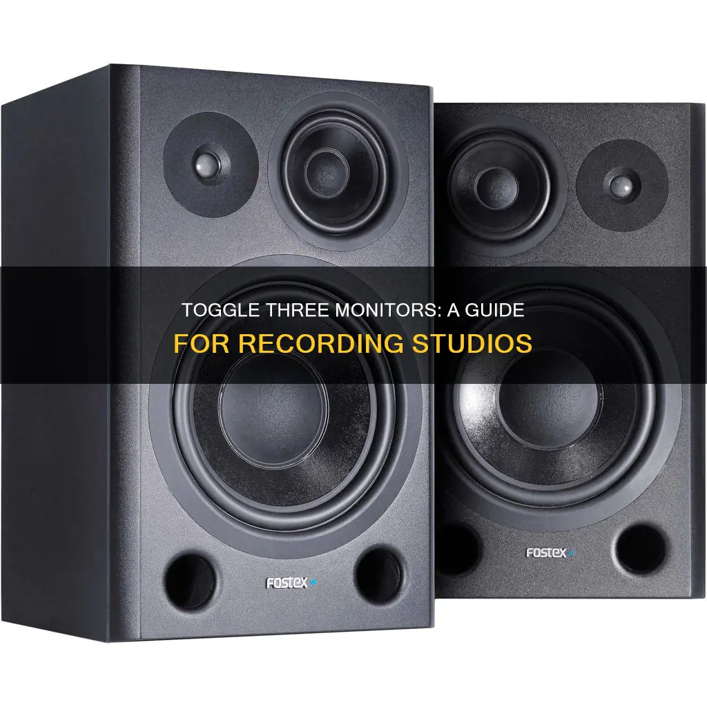 how to toggle three monitors in a recording studio