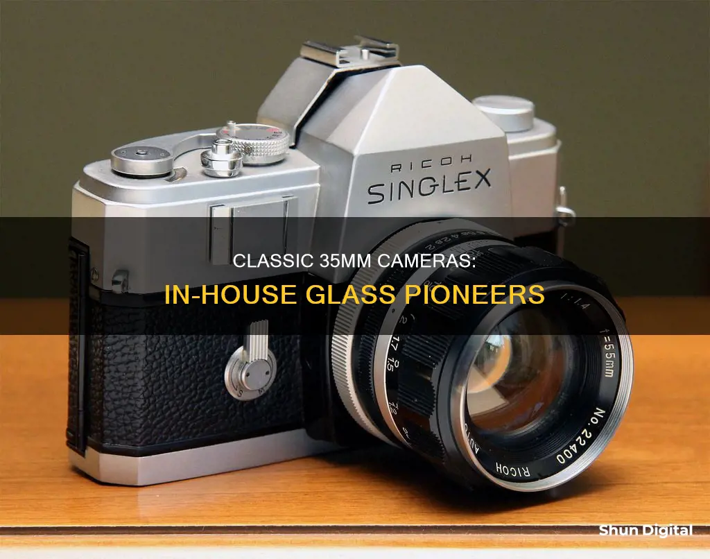 which early 35mm camera companies made their own glass